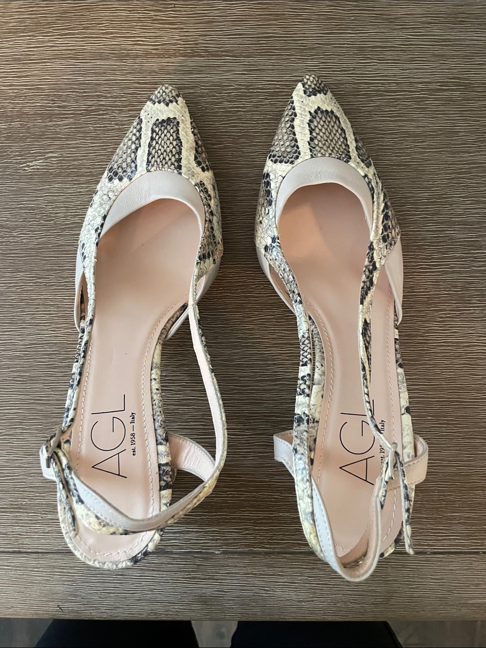 AGL Snake-Print Pointed Slingback Heels in Cream and Black
